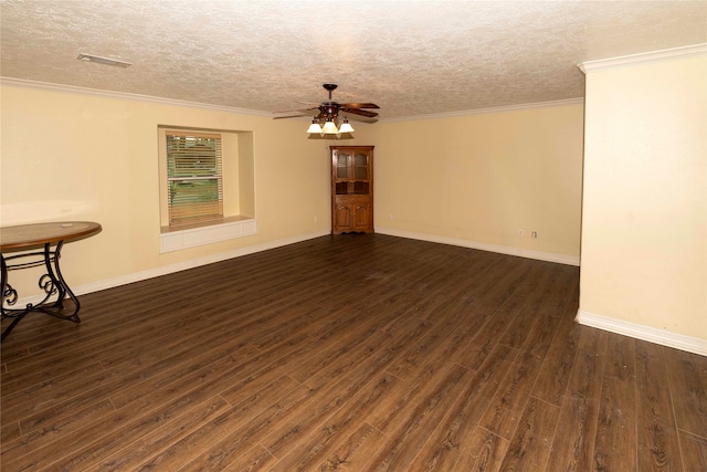 unfurnished room with a textured ceiling, crown molding, ceiling fan, and dark hardwood / wood-style flooring