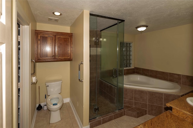 bathroom with a textured ceiling, toilet, plus walk in shower, and tile floors