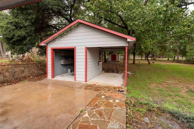 garage with a yard