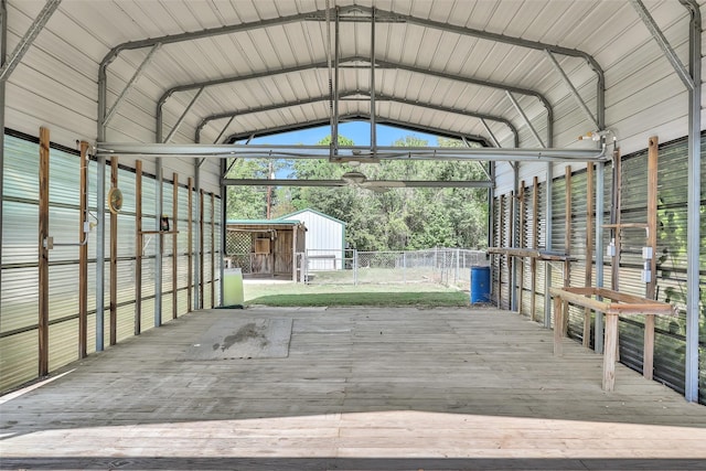 351 Trinity Dr, Trinity, TX 75862 - wooden deck with an outdoor structure and a detached carport