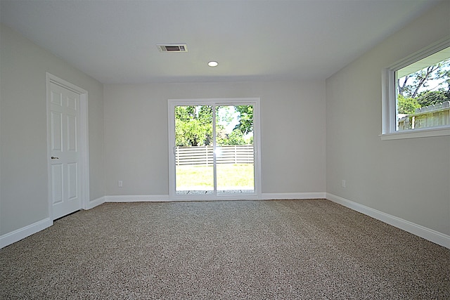 spare room with carpet flooring