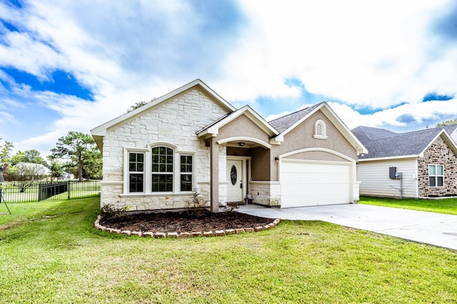 view of front of home with a front lawn and a garage