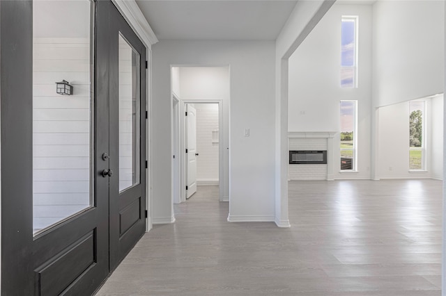 foyer with light wood-type flooring