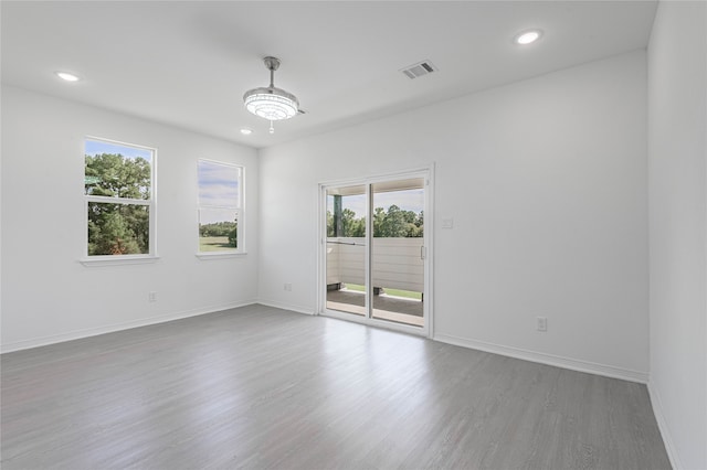 unfurnished room featuring light wood-type flooring