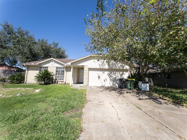 single story home featuring a front lawn and a garage