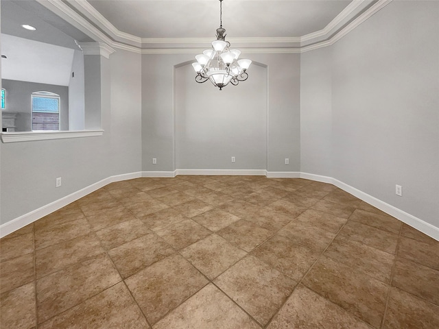 unfurnished room featuring decorative columns, ornamental molding, and a chandelier