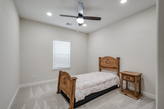 carpeted bedroom with ceiling fan