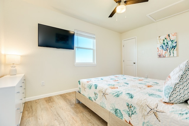 bedroom featuring ceiling fan and light wood-type flooring