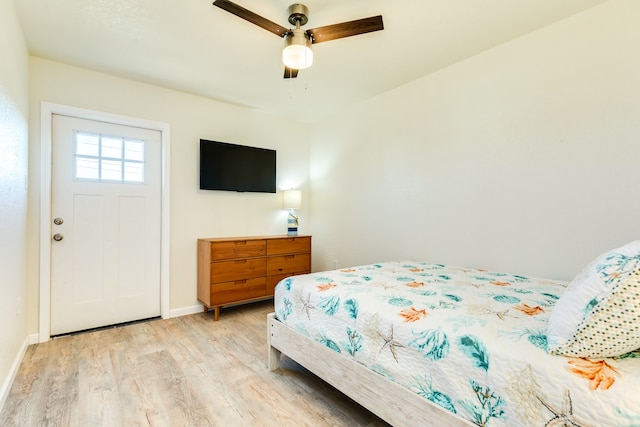 bedroom featuring ceiling fan and light wood-type flooring