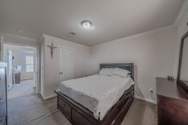 bedroom featuring crown molding, a textured ceiling, and light carpet