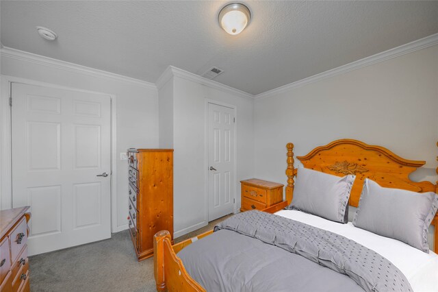 bedroom featuring dark carpet and ornamental molding