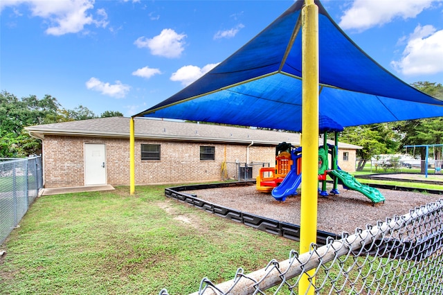 view of jungle gym with a yard