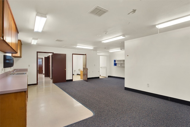 interior space with visible vents and a sink