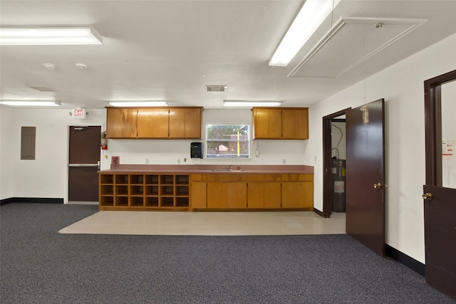 kitchen featuring electric water heater and electric panel