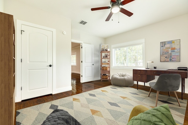 interior space with dark hardwood / wood-style flooring and ceiling fan