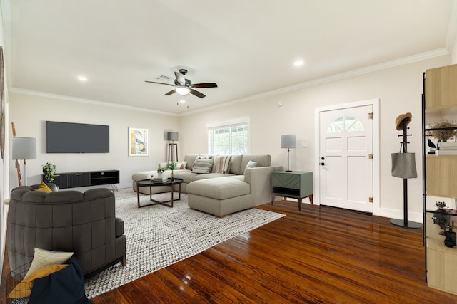 living room with dark hardwood / wood-style floors, ornamental molding, and ceiling fan