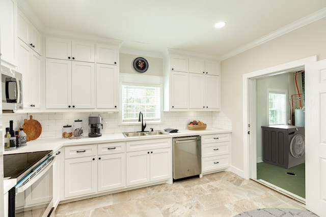 kitchen featuring sink, light tile floors, white cabinets, appliances with stainless steel finishes, and backsplash