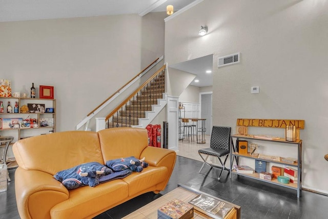 living room featuring high vaulted ceiling