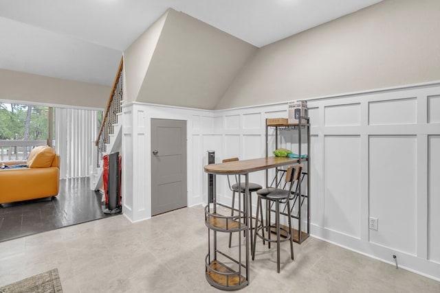 interior space featuring vaulted ceiling