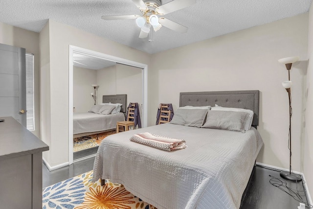 bedroom featuring ceiling fan, a closet, a textured ceiling, and hardwood / wood-style flooring