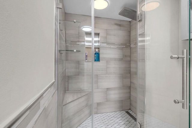 bathroom featuring an enclosed shower