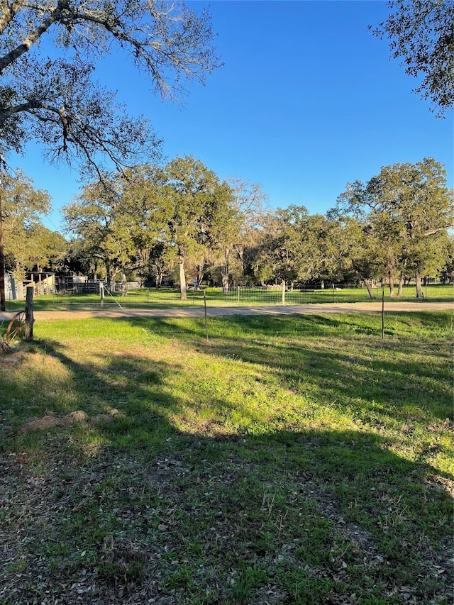 view of community featuring a lawn