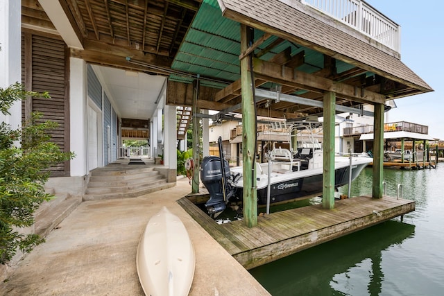 view of dock with a water view