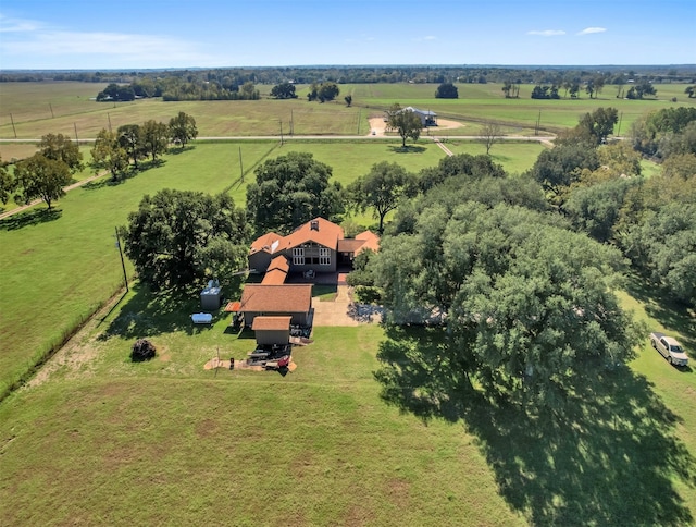 birds eye view of property featuring a rural view