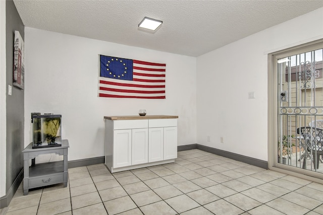 interior space featuring a textured ceiling