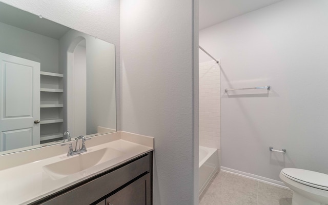 full bathroom with tile floors, bathtub / shower combination, toilet, and vanity