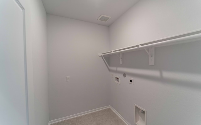 laundry area featuring hookup for a washing machine, carpet floors, and electric dryer hookup