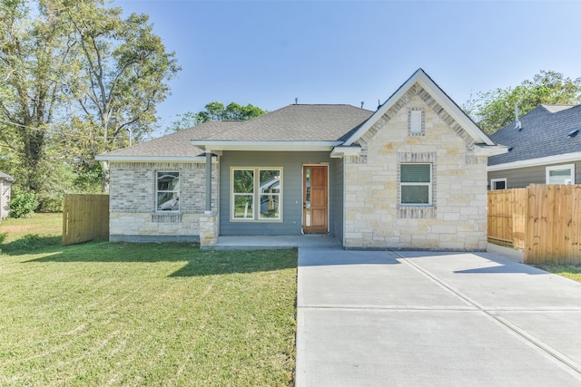 view of front of property with a front lawn