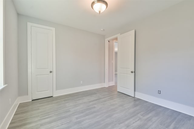 unfurnished room featuring light hardwood / wood-style flooring