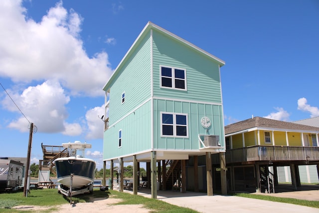 back of property featuring a carport