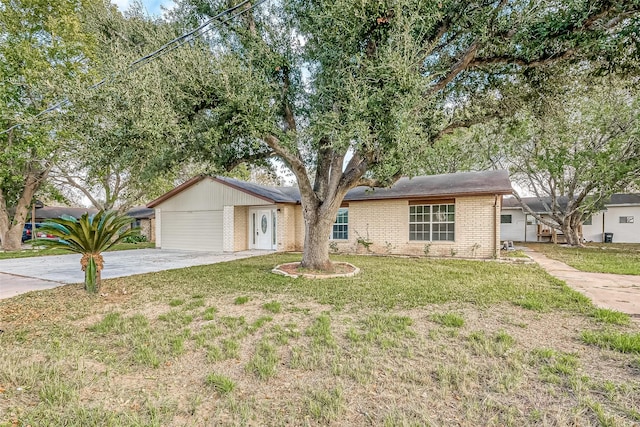 view of front facade with a garage and a front lawn