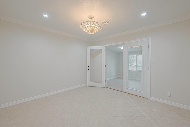 tiled empty room with ornamental molding and a chandelier