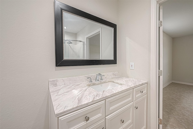 bathroom featuring vanity and tile patterned floors