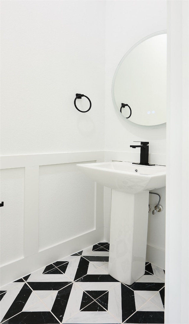 bathroom featuring tile patterned flooring