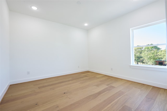 unfurnished room featuring light wood-type flooring