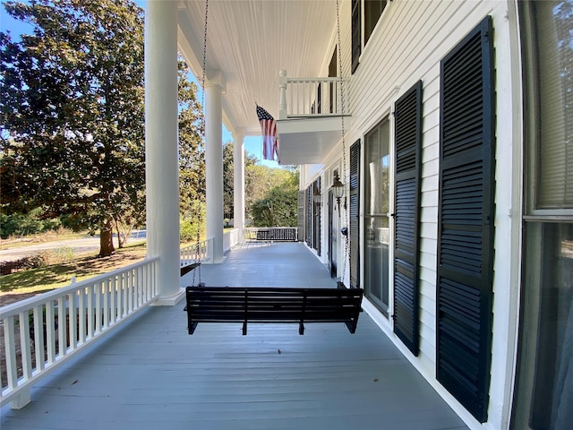 wooden deck featuring a porch