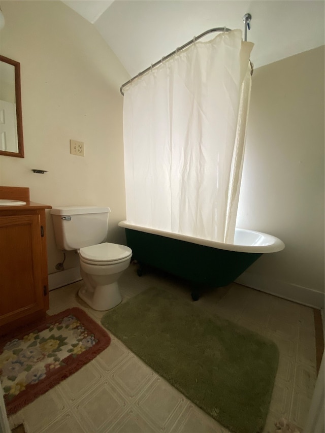 full bathroom featuring vanity, lofted ceiling, plus walk in shower, and toilet