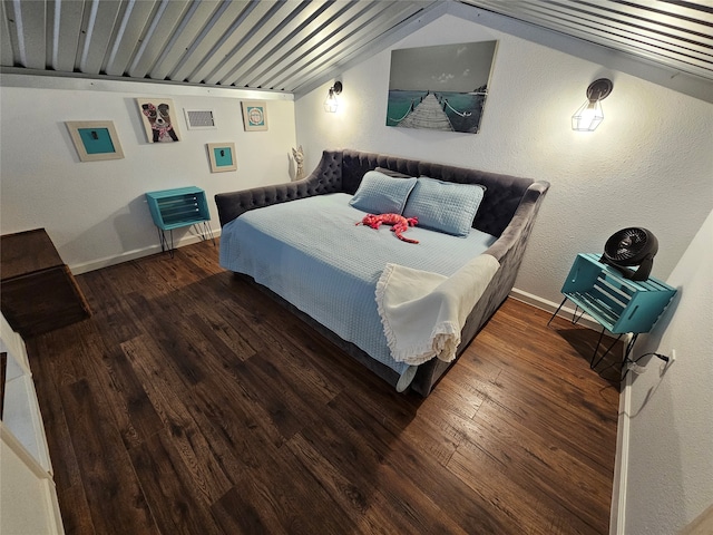 bedroom featuring dark wood-type flooring