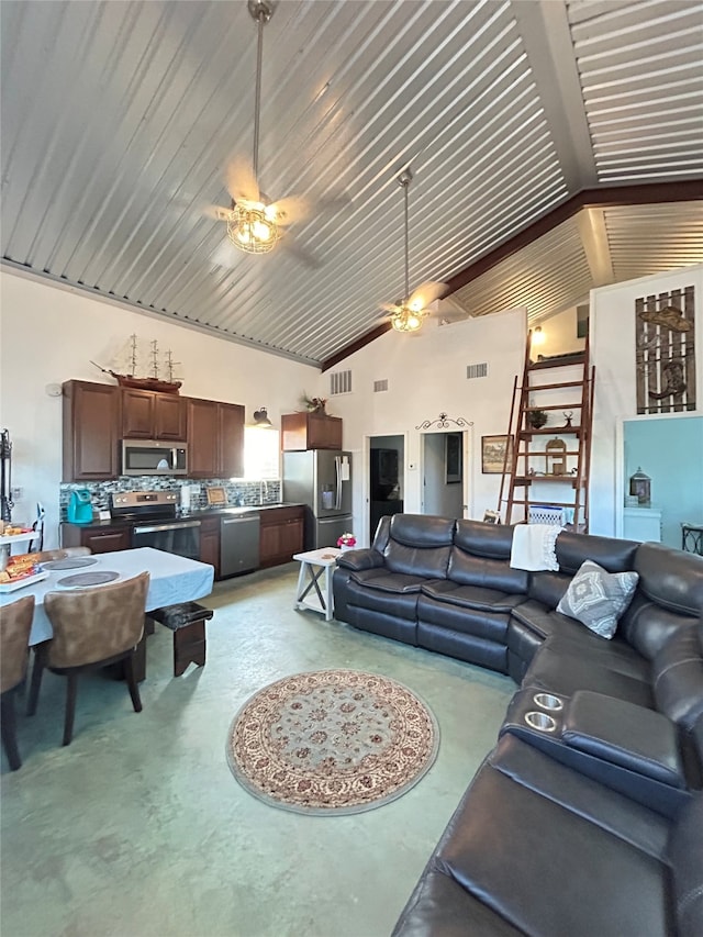 living room with high vaulted ceiling and ceiling fan