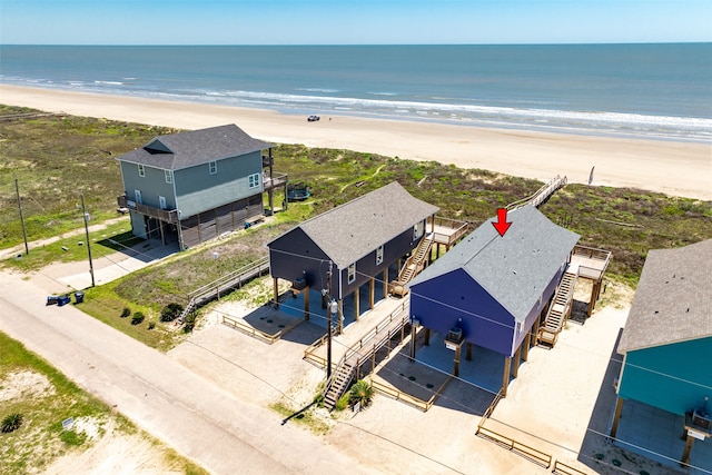 aerial view with a view of the beach and a water view