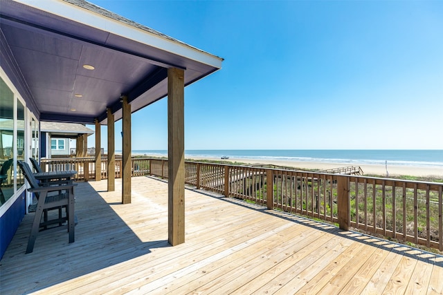 wooden deck with a water view