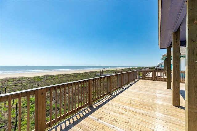 wooden deck featuring a water view