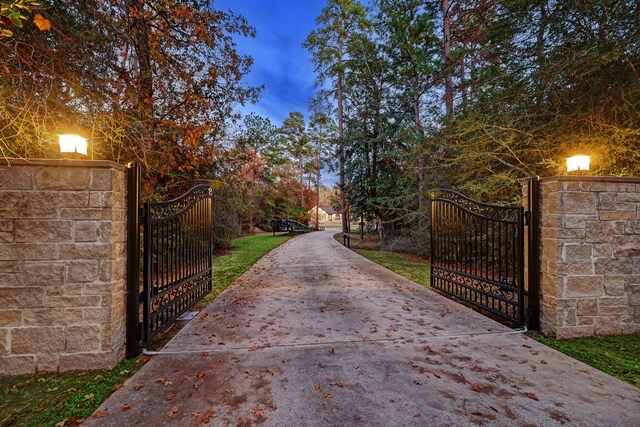 view of gate at dusk