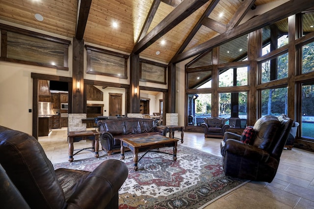 living room with beam ceiling, wooden ceiling, and high vaulted ceiling