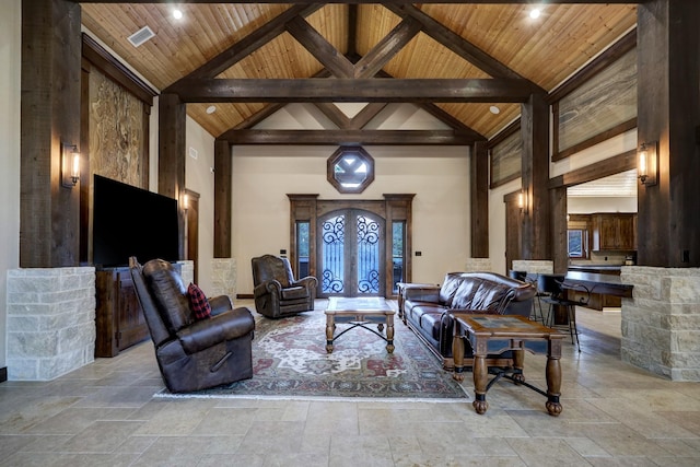 living room featuring beam ceiling, high vaulted ceiling, and wooden ceiling