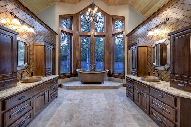 bathroom with a bathing tub, wooden ceiling, and high vaulted ceiling